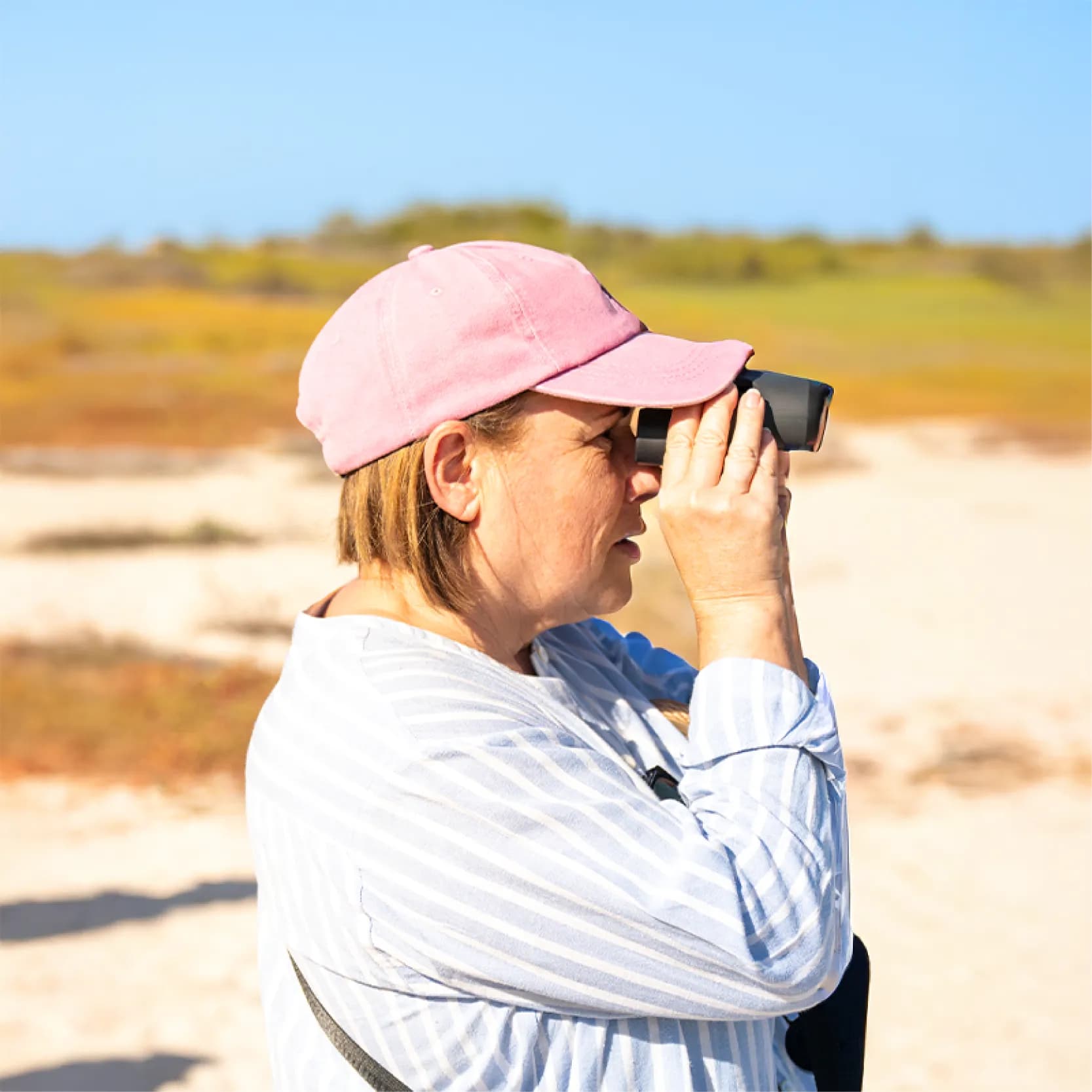 Tourist photographing Galapagos nature